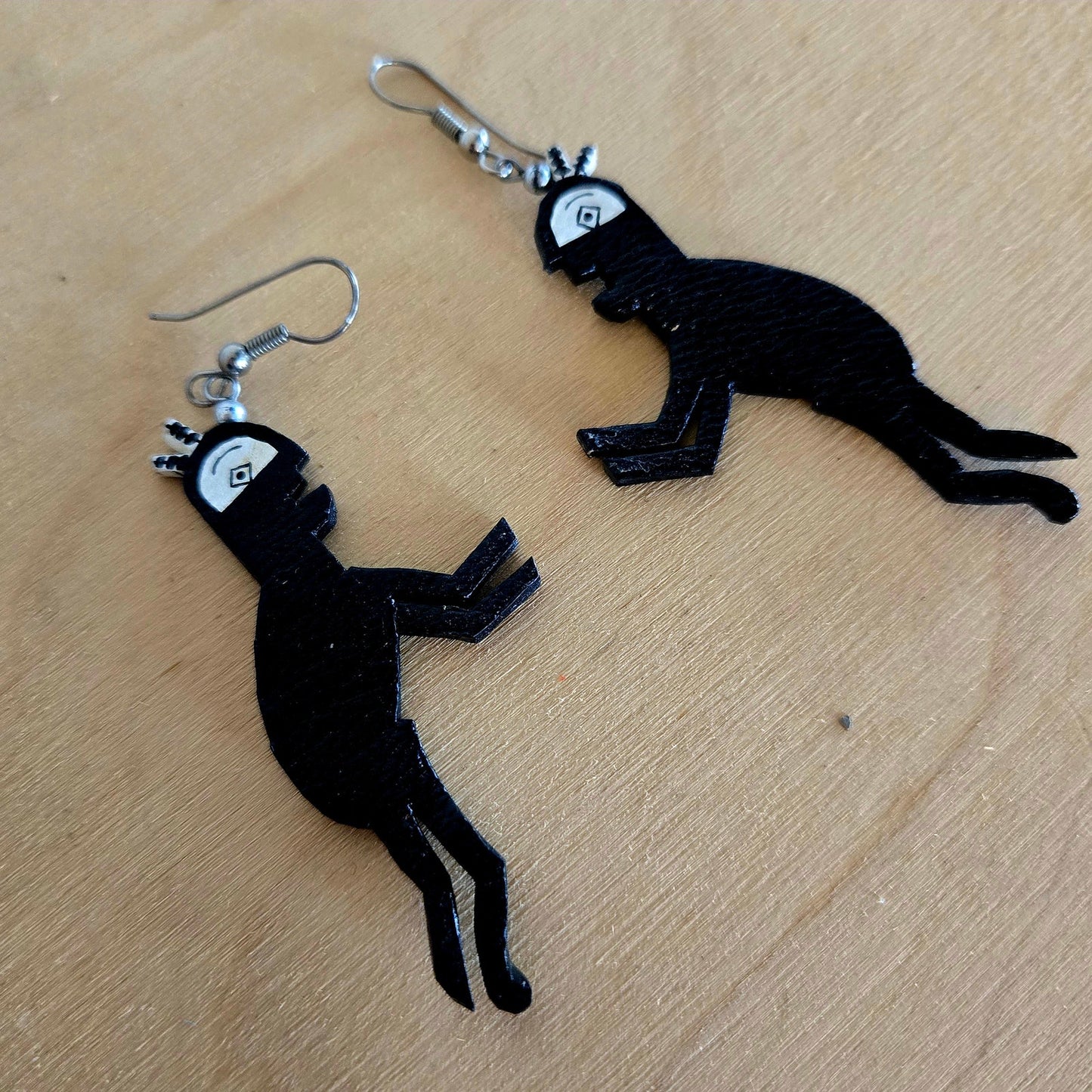 Dangling handmade earrings cryptids