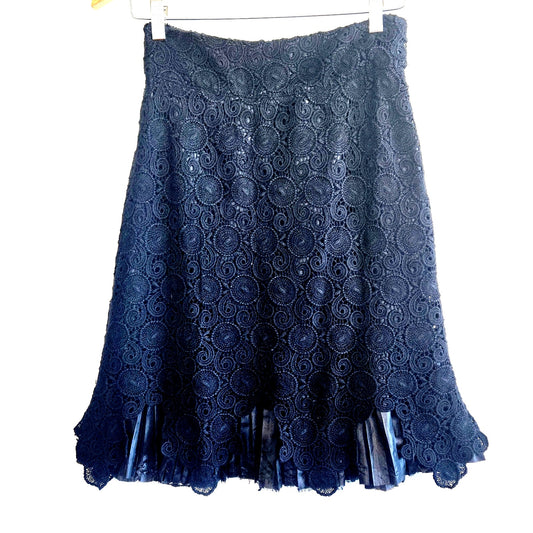 Size 2 – Anthropologie black crochet overlay skirt with pleated satin hem